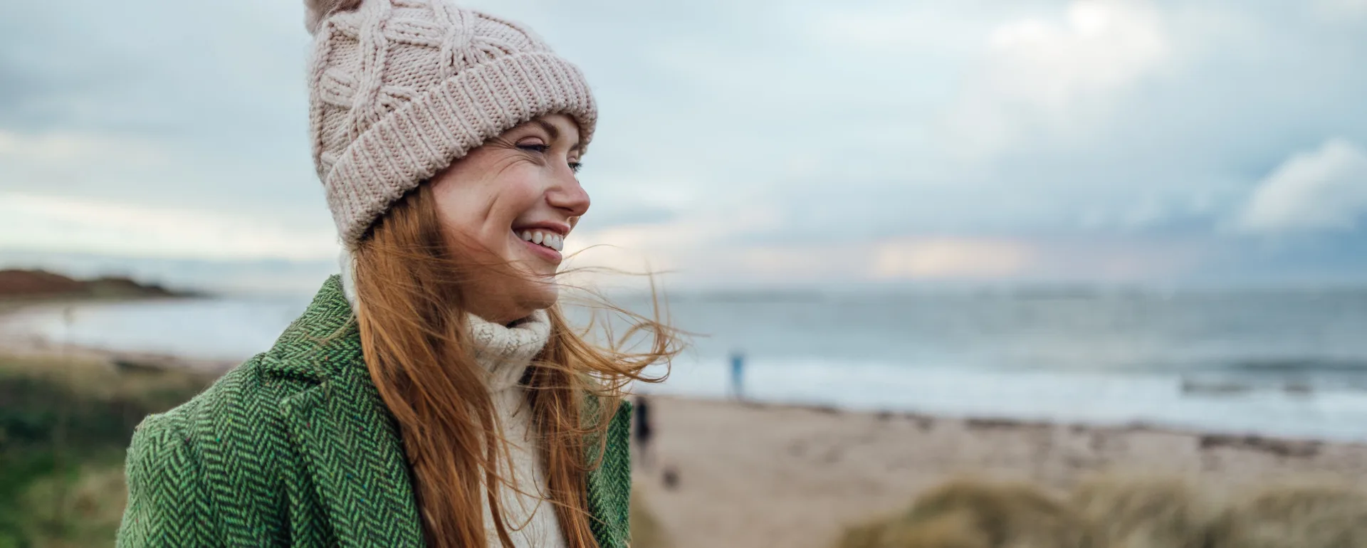 Woman smiling on a beach